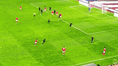 A Soccer Game Is Being Played On A Field With A Sign That Says Apuesta Deportiva GIF