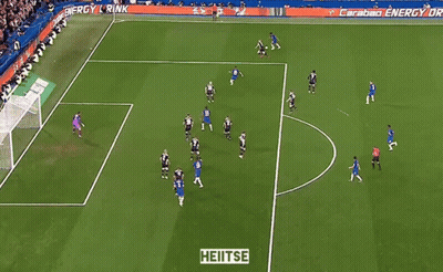 A Soccer Game Is Being Played On A Field With A Sign That Says Heitse GIF