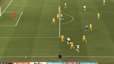 A Soccer Game Is Being Played On A Field With A Sign That Says ' United Airlines ' On It GIF