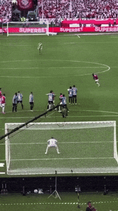 A Soccer Game Is Being Played On A Field With A Superbet Banner In The Background GIF