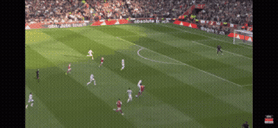 A Soccer Game Is Being Played On A Field With Absolute Touch Advertisements On The Sidelines GIF