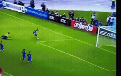 A Soccer Game Is Being Played On A Field With Ads For Coca Cola And Adidas GIF