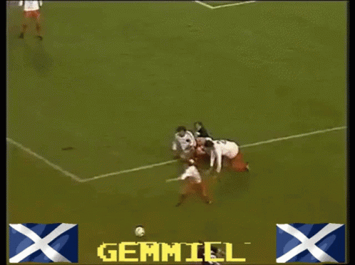 A Soccer Game Is Being Played On A Field With Advertisements For Gillette Mothercare And Guinness GIF