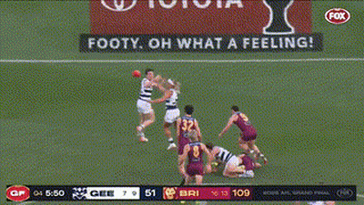 A Soccer Game Is Being Played On A Field With An Ad For Toyota In The Background GIF