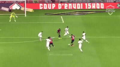 A Soccer Game Is Being Played On A Field With An Advertisement For Losc.fr In The Background GIF