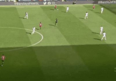 A Soccer Game Is Being Played On A Field With Barclays Fawsl Written On The Sidelines GIF