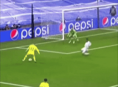 A Soccer Game Is Being Played On A Field With Pepsi Ads In The Background GIF