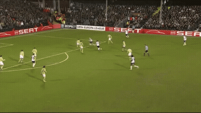 A Soccer Game Is Being Played On A Field With Seat Advertisements On The Sidelines GIF