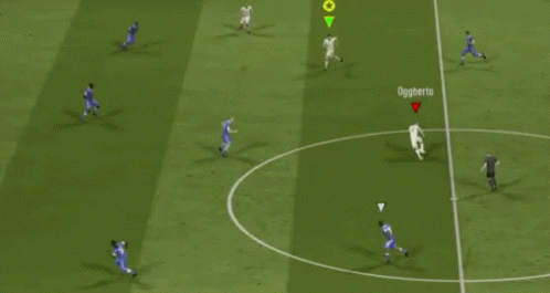 A Soccer Game Is Being Played On A Green Field With A Player Named Oggiberto GIF