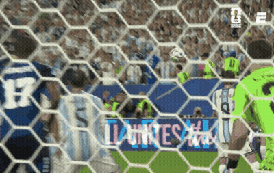 A Soccer Game Is Being Played With A Banner Behind The Net That Says " Lunes " GIF