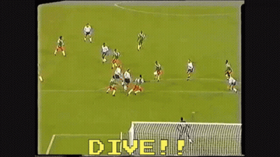 A Soccer Game Is Being Played With The Words " Dive " In Yellow Letters GIF