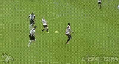 A Soccer Game Is Being Watched By A Crowd Of People GIF