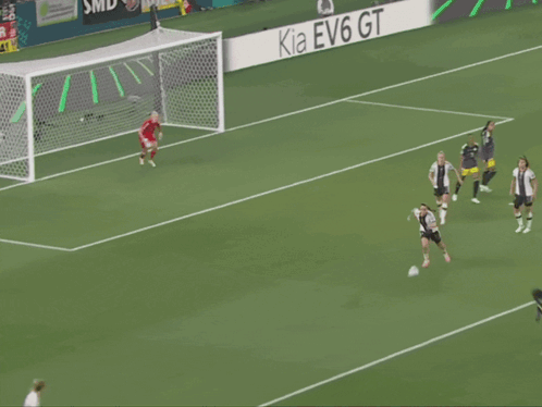 A Soccer Game With A Sign That Says " Ist Die Burger Sind " GIF
