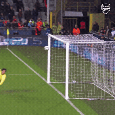 A Soccer Goal With The Arsenal Logo On The Back GIF