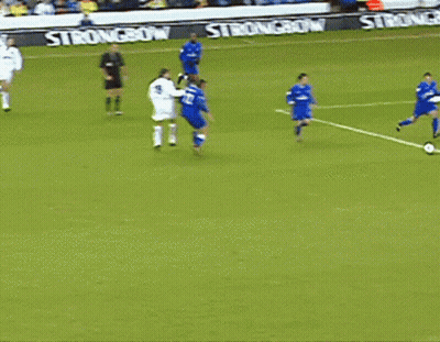 A Soccer Goalie Is Diving To Catch A Ball In The Goal GIF