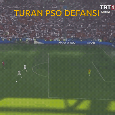 A Soccer Goalie Is Diving To Catch A Ball With The Words Turan Psq Defansi In The Background GIF