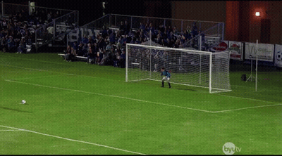 A Soccer Goalie Stands In Front Of A Net With A Byu Tv Logo In The Corner GIF