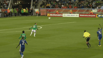 A Soccer Goalie Stands In Front Of A Seara Advertisement GIF