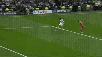 A Soccer Goalie With The Number 1 On His Shirt Is Diving To Catch A Soccer Ball . GIF
