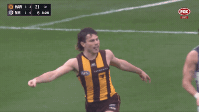 A Soccer Player Celebrates A Goal Against Hawthorn GIF