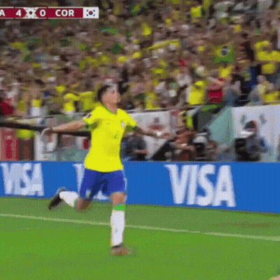 A Soccer Player Celebrates A Goal In Front Of A Visa Ad GIF