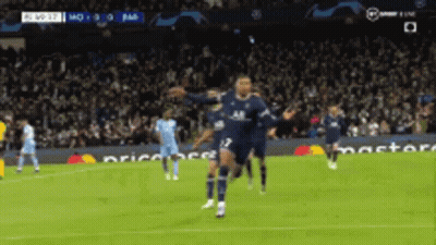 A Soccer Player Celebrates A Goal With His Teammates GIF