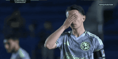 A Soccer Player Covering His Face During A Toluca Vs. Santos Game GIF