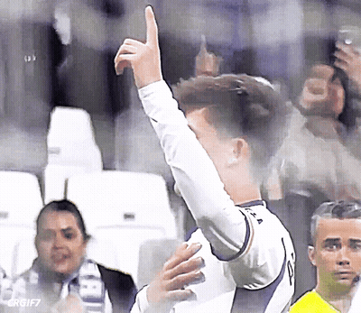A Soccer Player Giving A Thumbs Up In Front Of The Crowd GIF