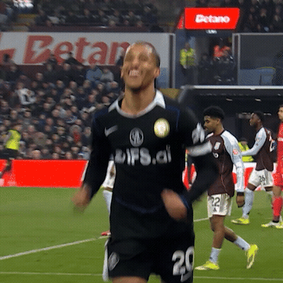 A Soccer Player In A Black Jersey With The Number 20 On It GIF