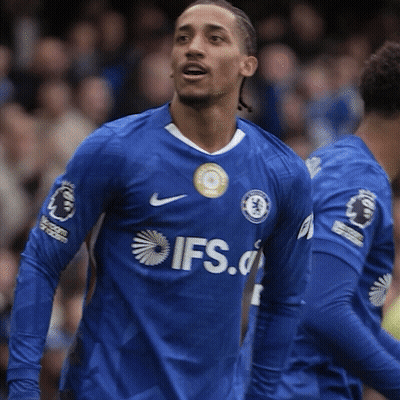 A Soccer Player In A Blue Ifs Jersey Stands In Front Of A Crowd GIF