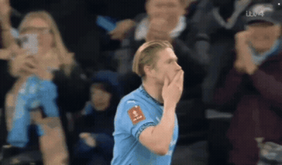 A Soccer Player In A Blue Jersey With A Sticker On His Chest That Says ' Fc Barcelona ' GIF