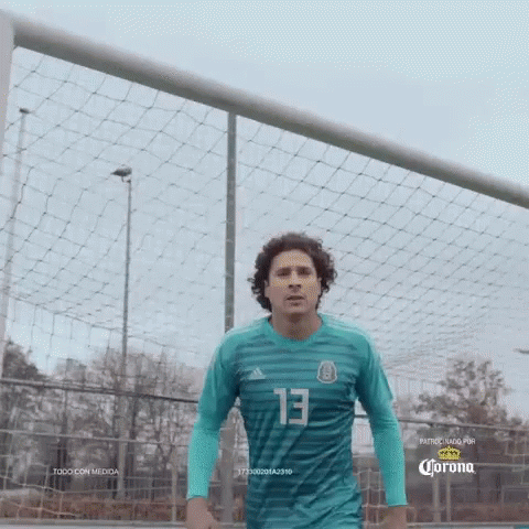 A Soccer Player In A Blue Jersey With The Number 13 On It GIF