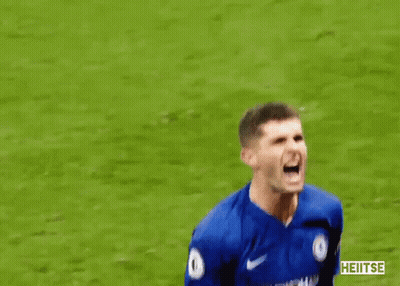 A Soccer Player In A Blue Shirt Is Screaming On The Field GIF