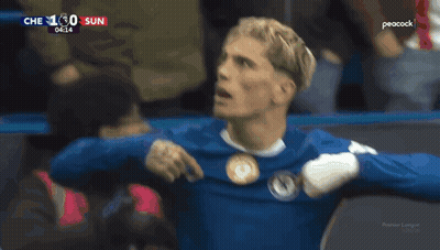 A Soccer Player In A Blue Shirt With The Word Chelsea On The Front GIF