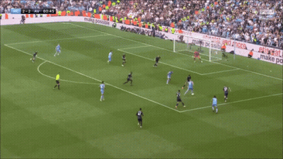 A Soccer Player In A Light Blue Jersey With The Number 12 On The Back GIF