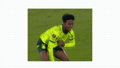 A Soccer Player In A Neon Green Crefisa Jersey Celebrates GIF