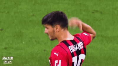 A Soccer Player In A Red And Black Emirates Fly Better Jersey GIF