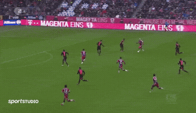 A Soccer Player In A Red And Blue Jersey With The Year 2014/15 On The Bottom GIF