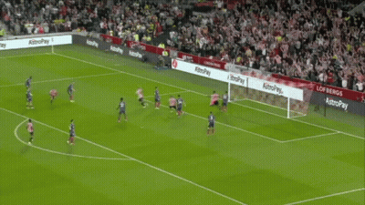 A Soccer Player In A Red And White Striped Shirt With The Number 7 On It GIF
