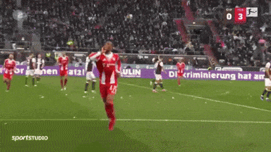 A Soccer Player In A Red And White Uniform With The Number 17 On It GIF