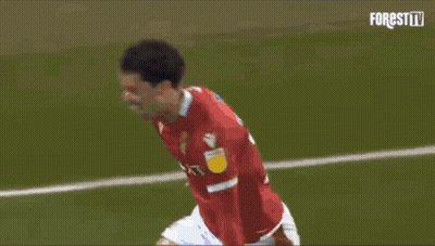 A Soccer Player In A Red Jersey Celebrates His Goal GIF