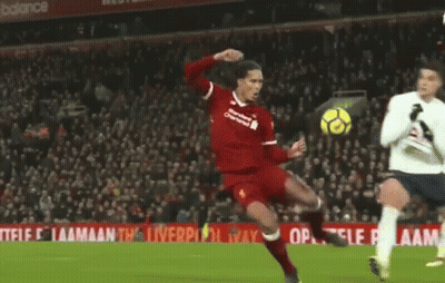 A Soccer Player In A Red Jersey With Liverpool On It GIF