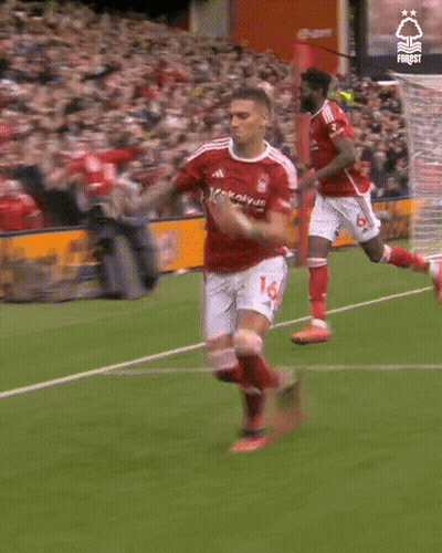 A Soccer Player In A Red Jersey With The Number 14 On It GIF