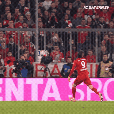 A Soccer Player In A Red Jersey With The Number 9 On It GIF