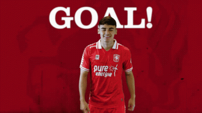 A Soccer Player In A Red Shirt With Pure Energie On It GIF