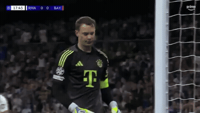 A Soccer Player In A T-Mobile Jersey Stands In Front Of The Goal GIF