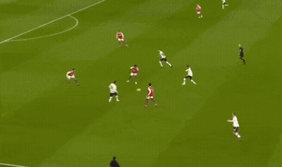 A Soccer Player In A White Shirt Is Running On The Field . GIF