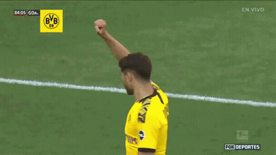 A Soccer Player In A Yellow Jersey With The Number 5 On The Back GIF