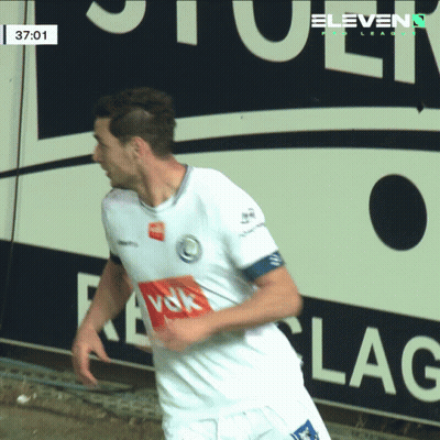 A Soccer Player In Front Of A Sign That Says " Eleven " GIF