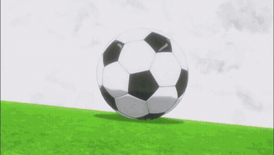 A Soccer Player In Red Shorts Is Kicking A Soccer Ball GIF